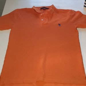 U.S. Polo Assn orange shirt.